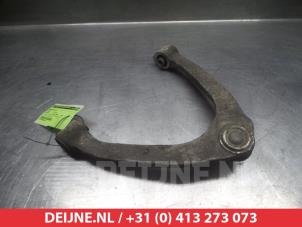 Nissan 370Z Draagarm Boven links-voor O380559 foto 2