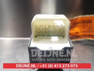 Toyota Yaris Multi-functional window switch O312527 photo 2