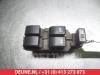 Schakelblok ruiten van een Daihatsu Cuore (L251/271/276), 2003 1.0 12V DVVT, Hatchback, Benzine, 998cc, 51kW (69pk), FWD, 1KRFE, 2007-04, L271; L276 2008