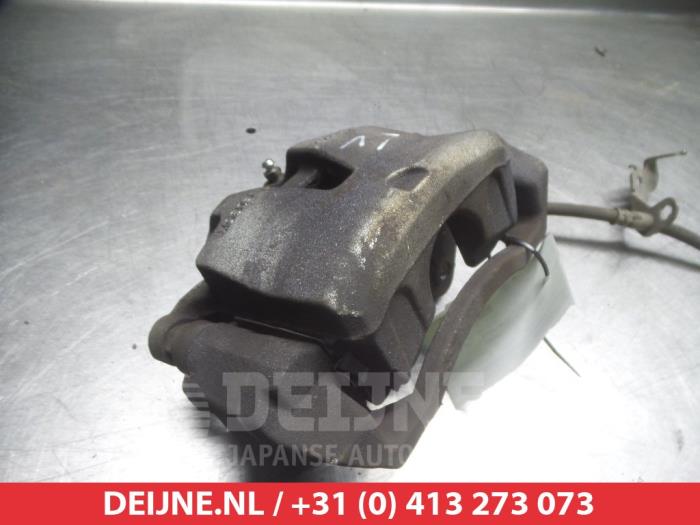 Kia Sportage Front brake calliper, left O325096