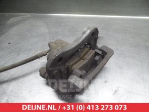 Kia Sportage Rear brake calliper, left O376333 photo 3