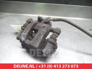 Kia Sportage Rear brake calliper, left O376333 photo 2
