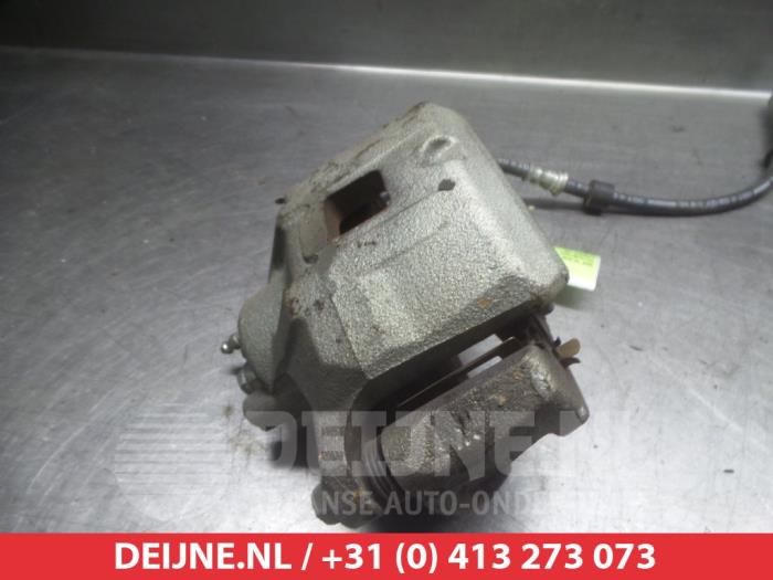 Mitsubishi Lancer Bremszange links vorne O325181