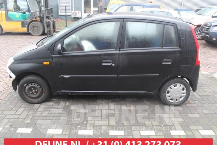 Daihatsu Cuore Tür 4-türig links vorne O272740