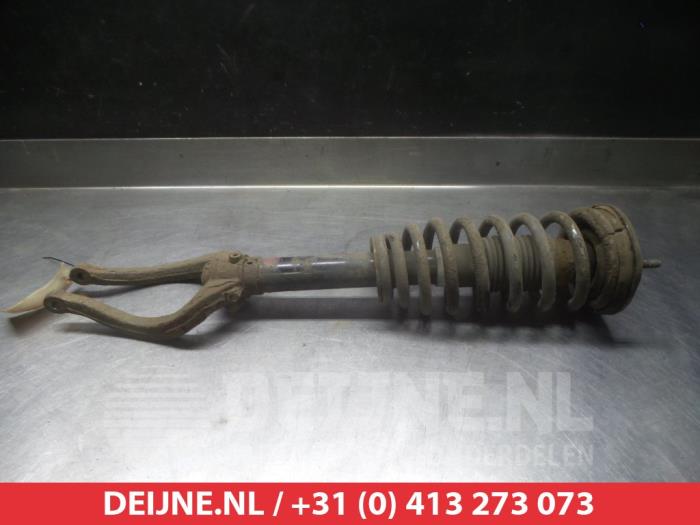 Hyundai XG Front shock absorber rod, left O320451