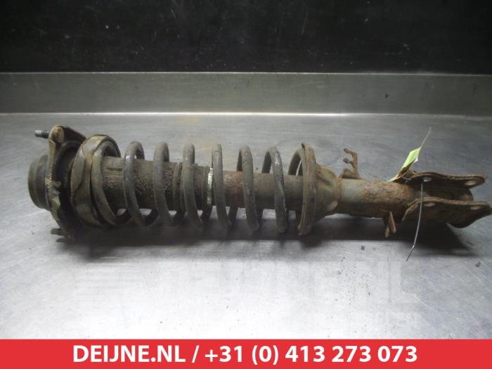 Kia Rio Front shock absorber rod, right O321503