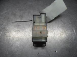 Nissan Almera Multi-functional window switch O311618 photo 2