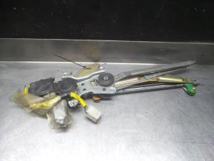 Toyota Camry Window mechanism 4-door, front left O276069 photo 2