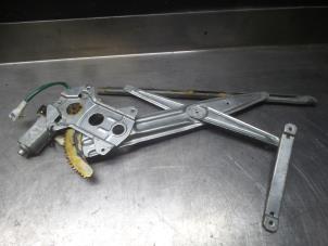 Subaru Justy Window mechanism 4-door, front left O275723 photo 2