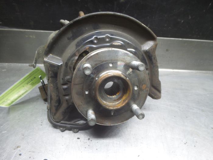 Daihatsu Cuore Fusee links-voor O322980