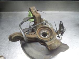 Daihatsu Cuore Achsschenkel links vorne O322980 foto 2