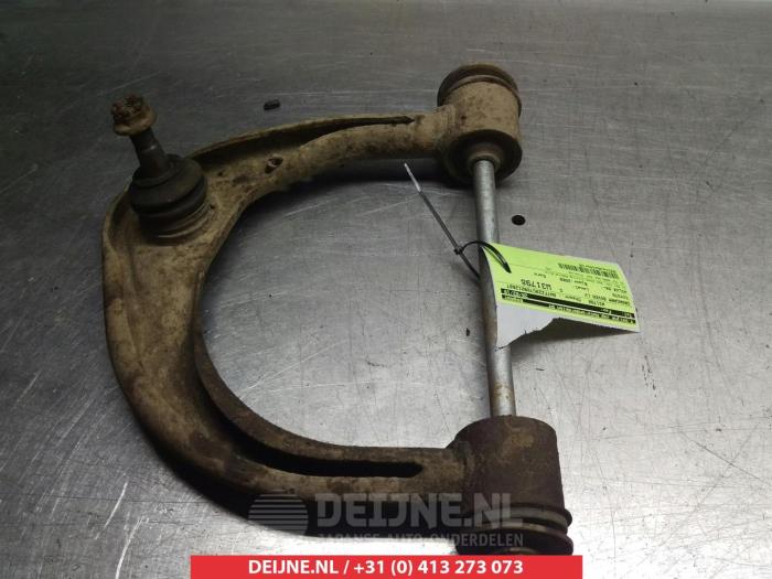 Toyota Hilux Draagarm Boven links-voor O380693