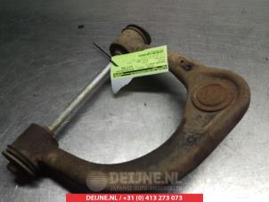 Toyota Hilux Querlenker oben links vorne O380693 foto 2