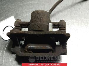 Toyota Avensis Rear brake calliper, left O376589 photo 2