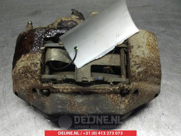 Toyota Hilux Front brake calliper, left O325599