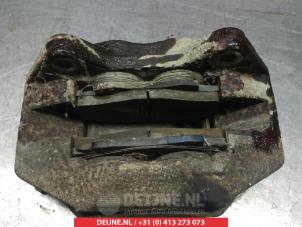 Toyota Hilux Front brake calliper, left O325599 photo 2