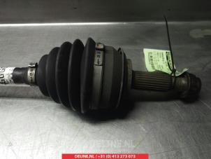 Toyota Yaris Aandrijfas links-voor O318780 foto 2