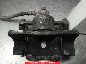 Suzuki Celerio Front brake calliper, left O325487 photo 2