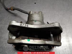 Mitsubishi Lancer Bremszange links vorne O325182 foto 2