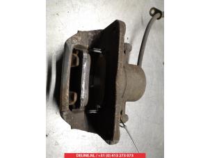 Toyota Previa Remklauw (Tang) links-voor O325562 foto 2