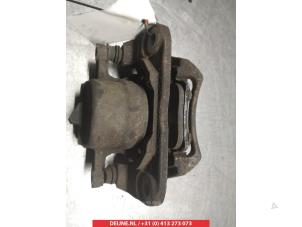 Toyota Previa Remklauw (Tang) links-voor O325562 foto 4