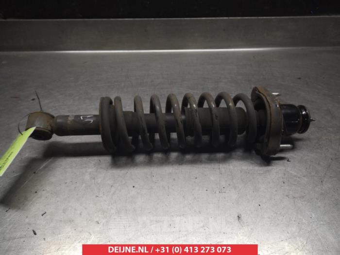 Mitsubishi Outlander Schokdemperpoot links-achter O377743