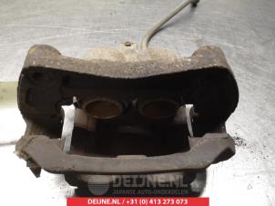 Nissan Pathfinder Remklauw (Tang) links-voor O324937 foto 2