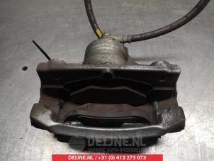 Toyota Aygo Front brake calliper, right O326964 photo 2
