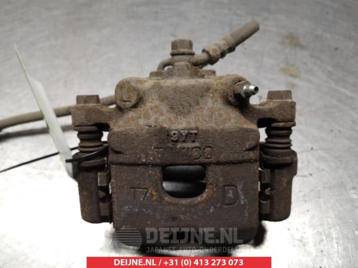 Daihatsu Cuore Remklauw (Tang) links-voor O325397