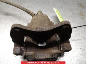 Daihatsu Cuore Bremszange links vorne O325397 foto 2