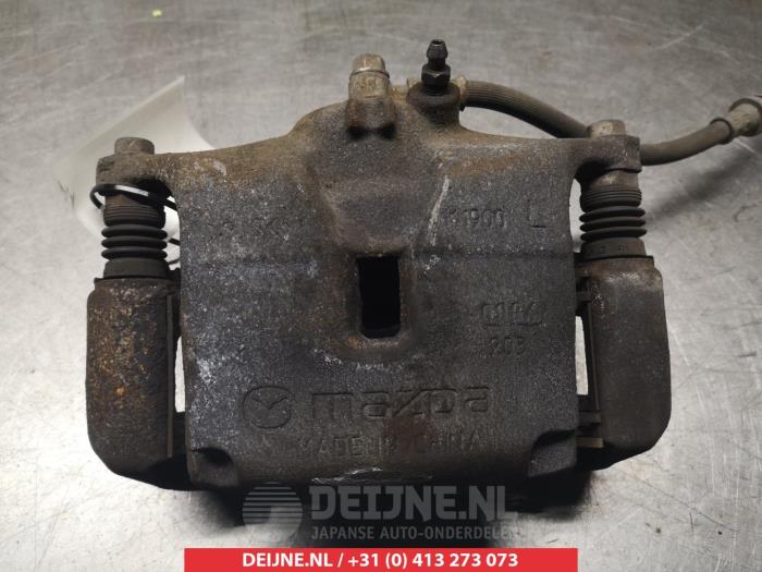 Mazda 3 Bremszange links vorne O324552