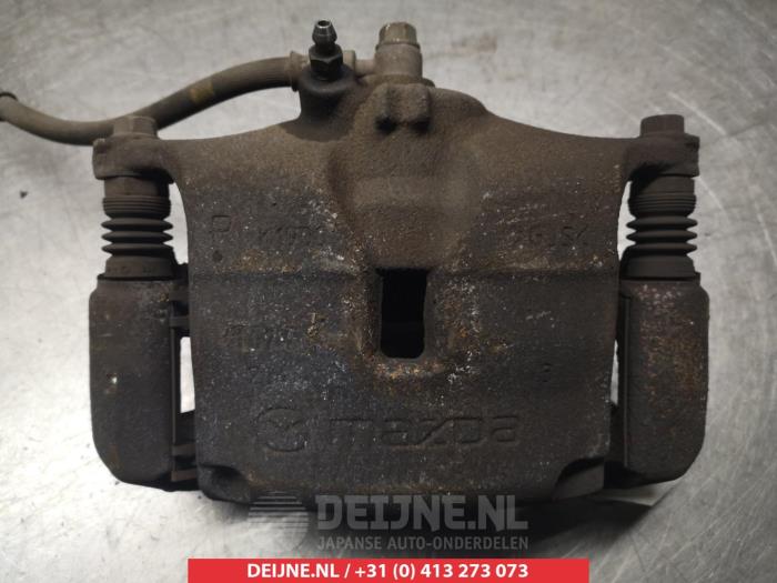 Mazda 3 Bremszange rechts vorne O325823