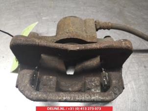 Toyota Previa Bremszange links hinten O376562 foto 2