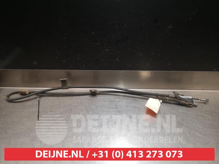 Gebruikte Handrem Kabel Nissan Almera (N16) 1.5 16V Prijs € 20,00 Margeregeling aangeboden door V.Deijne Jap.Auto-onderdelen BV