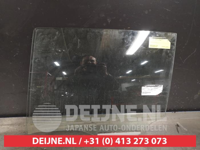 Subaru Justy Türscheibe 4-türig links hinten O287536