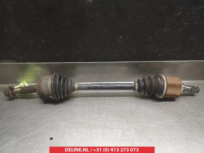 Nissan Almera Tino Aandrijfas links-voor O317825
