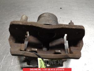 Mazda 323F Front brake calliper, left O324572 photo 2