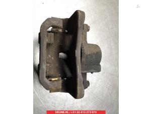Toyota Previa Rear brake calliper, left O376563 photo 2