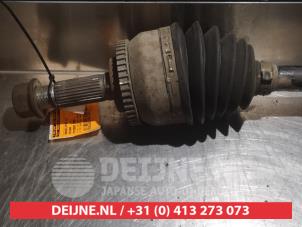 Nissan Primera Aandrijfas links-voor O317792 foto 2