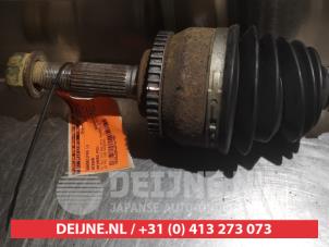 Nissan Primera Aandrijfas links-voor O317786 foto 2