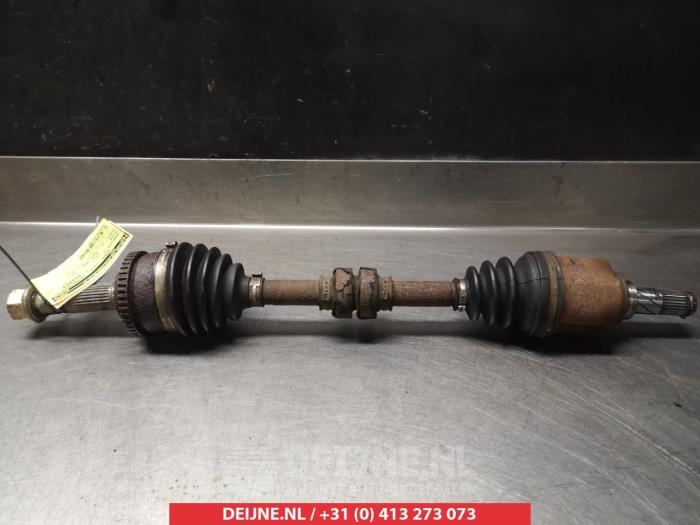 Nissan Almera Tino Aandrijfas links-voor O317818