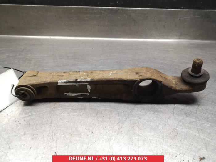 Subaru Justy Querlenker unten links vorne O381303