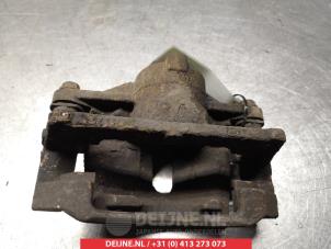 Subaru Justy Bremszange links vorne O324987 foto 2