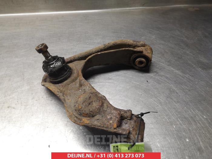 Nissan NP 300 Querlenker oben links vorne O380586