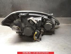 Ssang Yong Kyron Headlight, left O266569 photo 2