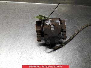 Ssang Yong Kyron Rear brake calliper, left O376365 photo 2