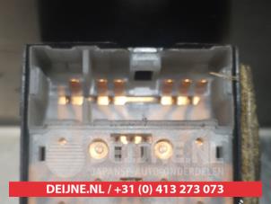 Nissan Micra CC Multi-functional window switch O311712 photo 2