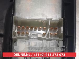 Nissan Almera Multi-functional window switch O311620 photo 2