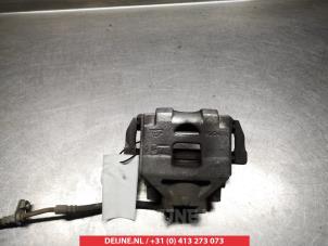 Toyota Yaris Front brake calliper, left O325752 photo 2