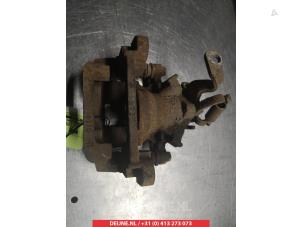 Mitsubishi Outlander Rear brake calliper, left O376392 photo 2